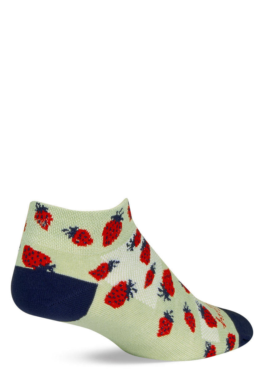 Light green athletic ankle socks for women with an allover pattern of red strawberries.