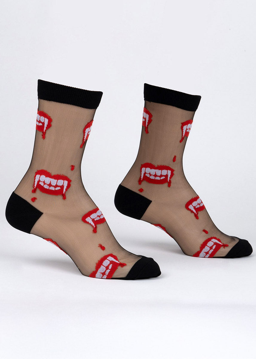 Black sheer crew socks for women with an allover pattern of red dripping vampire teeth.