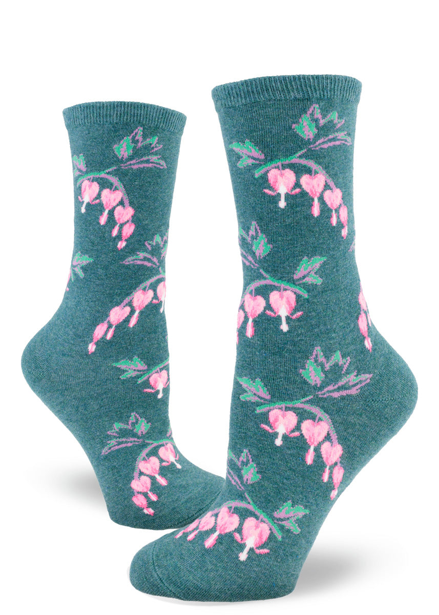 Dark teal crew socks for women with an allover pattern of pink bleeding heart flowers.