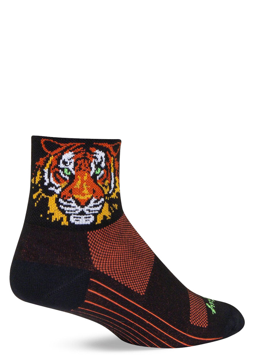 Black and orange athletic socks with a tiger face design on the cuff.