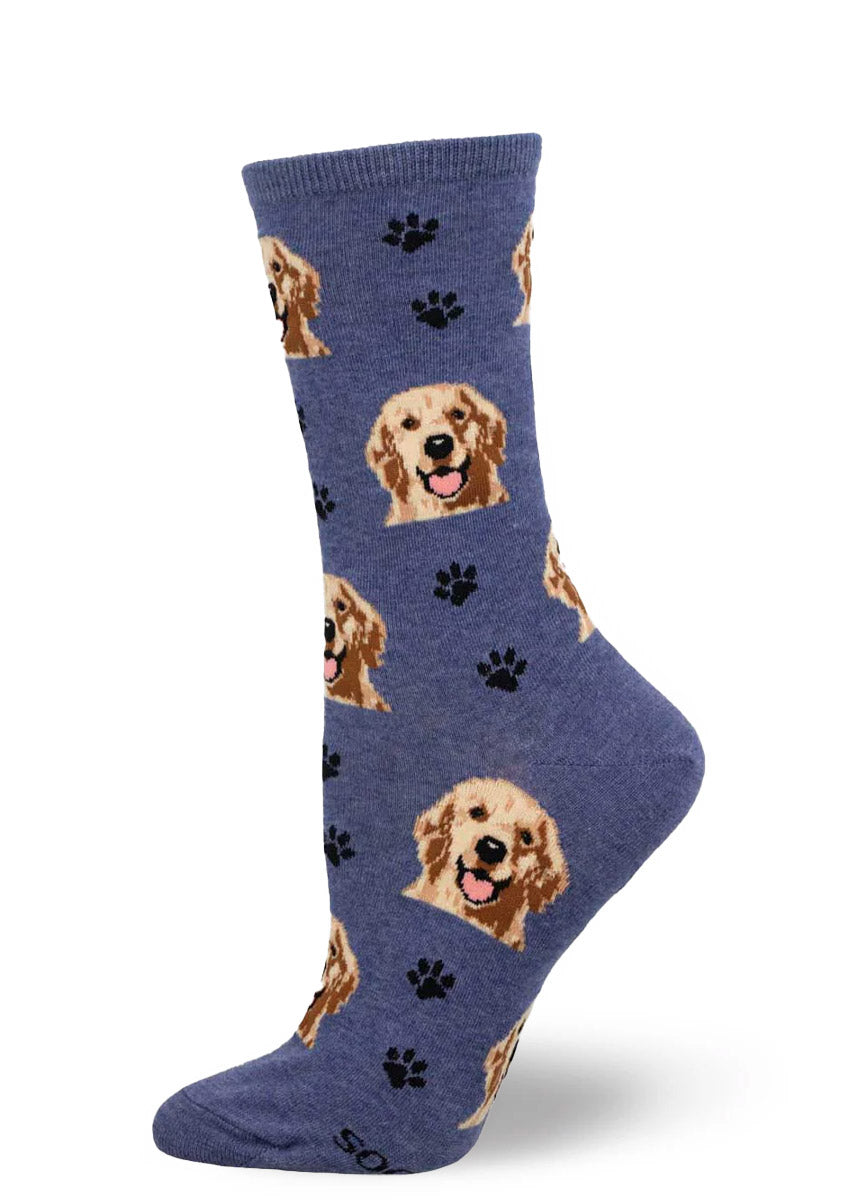 Blue crew socks for women with an allover pattern of golden retriever faces and black paw prints.