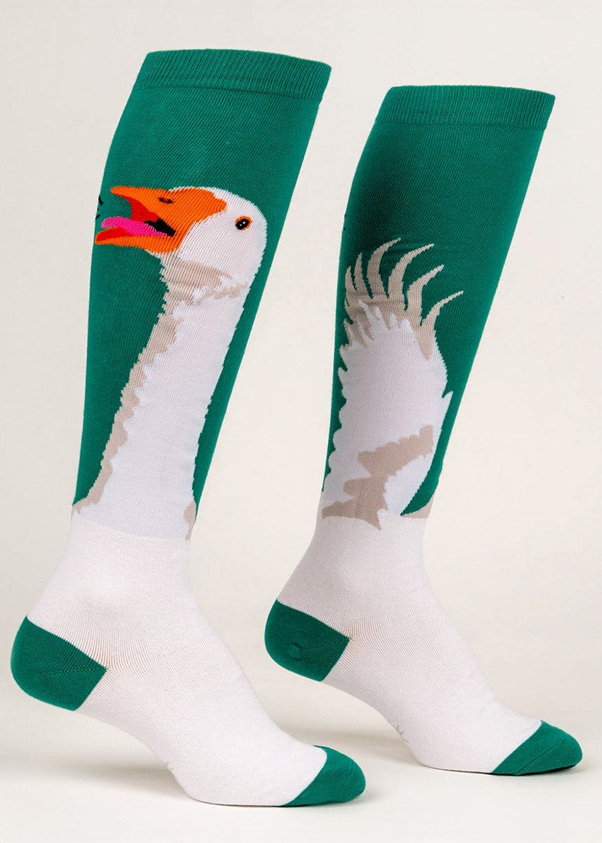 Teal knee socks for women featuring a white goose honking. 