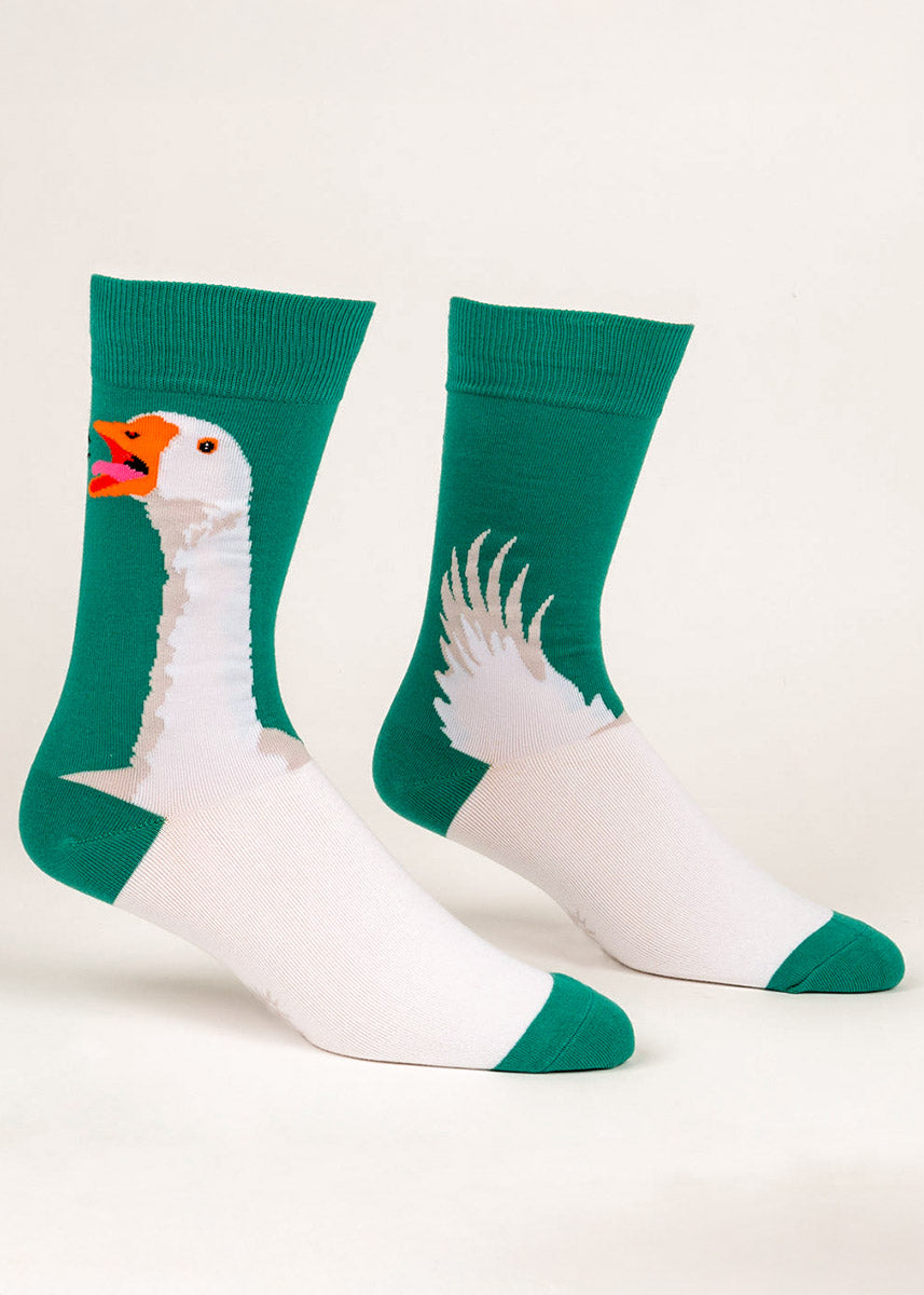 Teal crew socks for men featuring a white goose honking. 