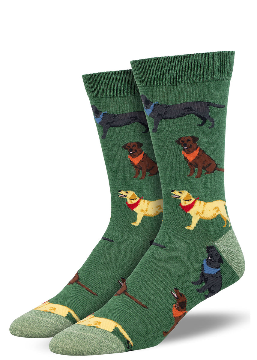 Dark green bamboo crew socks for men with an allover pattern of chocolate labs, yellow labs, and black labs wearing different colored bandanas.