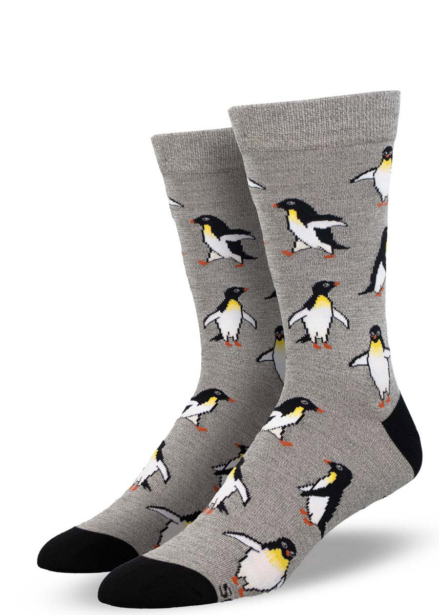 Light gray bamboo crew socks for men with an allover pattern of penguins.