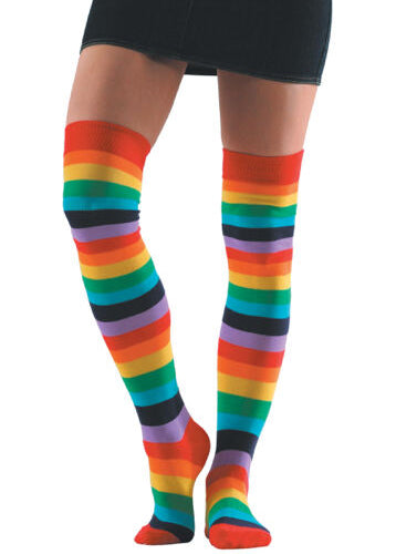 A female model poses wearing rainbow striped over-the-knee socks.