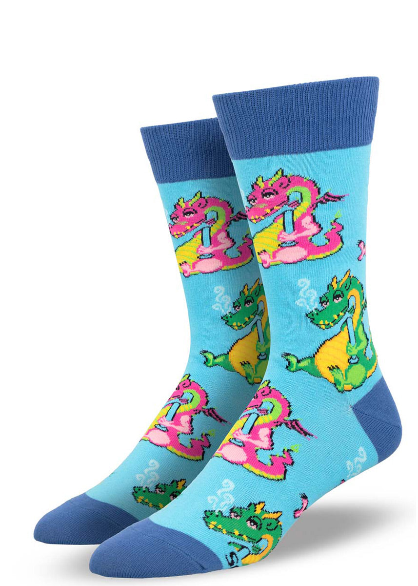 Blue novelty crew socks for men with a pattern of colorful dragons holding bongs and blowing smoke out of their nostrils.