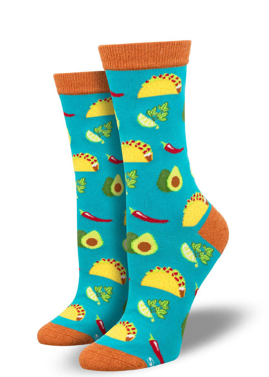 Teal bamboo crew socks for women with a bright allover pattern of tacos, avocado, chili peppers, and cilantro with lime.