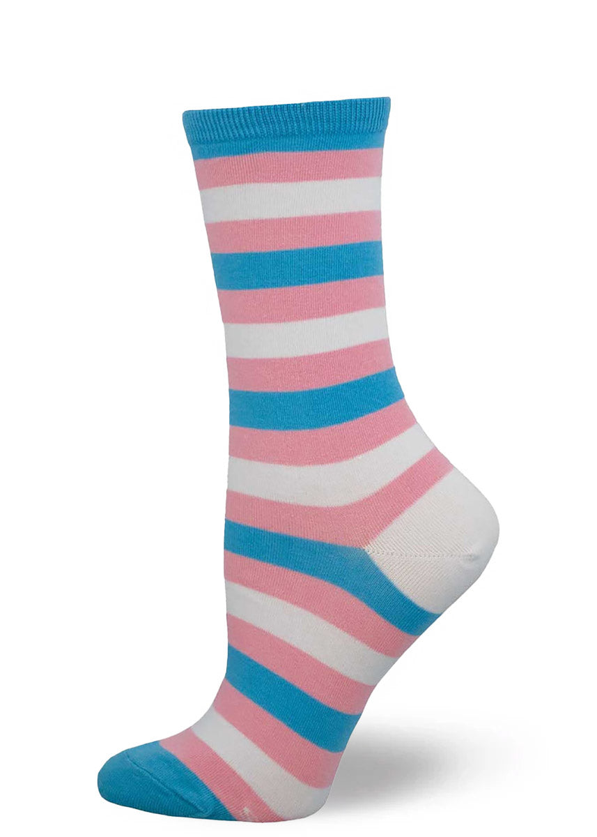 Small striped socks in the transgender pride flag color scheme of pink, blue, and white. 